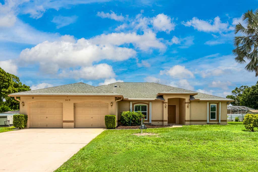 Photo of 649 NE HORIZON Lane, Port Saint Lucie, FL 34983 (MLS # B26059584)