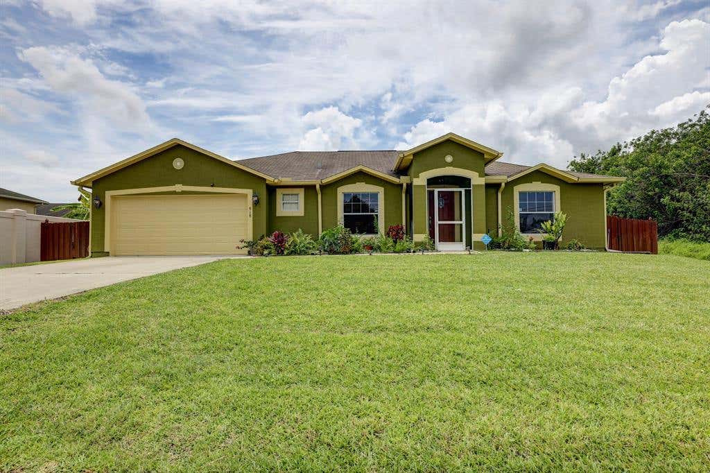 Photo of 918 SW Mcdevitt Avenue, Port Saint Lucie, FL 34953 (MLS # R10726570)