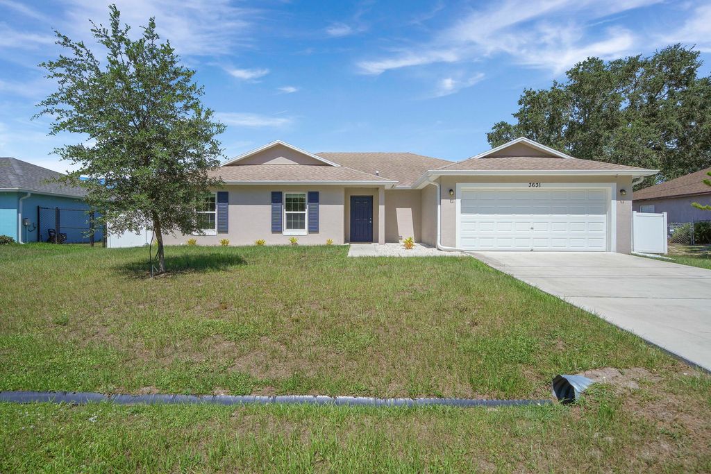 Photo of 3631 SW Kromrey Street, Port Saint Lucie, FL 34953 (MLS # B26009970)