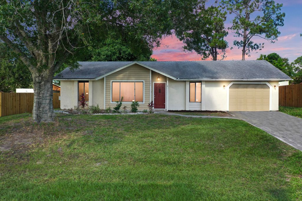 Photo of 1761 SW Anderson Street, Port Saint Lucie, FL 34953 (MLS # R10997592)