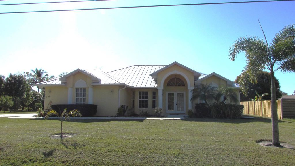 Photo of 388 SW Paar Drive, Port Saint Lucie, FL 34953 (MLS # R11053409)