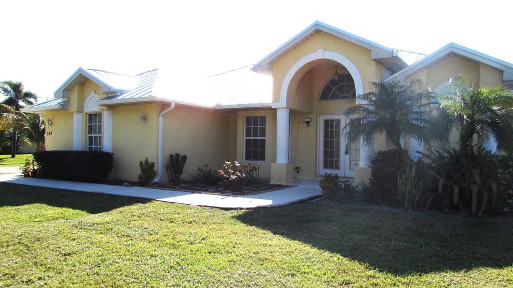 Photo of 388 SW Paar Drive, Port Saint Lucie, FL 34953 (MLS # R11053409)