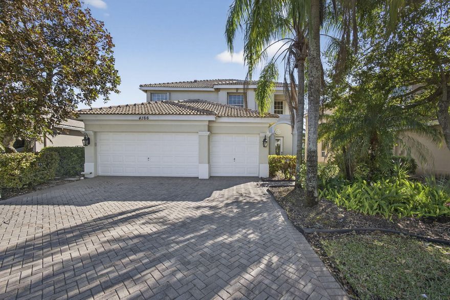 LAKE FRONT HOME + Excellent Location! This spacious 5BR/3BA offers nearly 3,000 sq ft of living space and a bright, open layout. Recent updates include elegant new flooring throughout the ground level, fresh interior paint, and a fenced backyard perfect for pets and outdoor enjoyment. The modern kitchen flows to expansive living and dining areas, while upstairs bedrooms provide comfort and privacy. Enjoy tranquil lake views, community clubhouse amenities, and one of the most walkable locations in Wellington, just minutes to Panther Run Elementary and Polo Park Middle School. A rare blend of lifestyle, location, and upgrades! A Capital Contribution $1185 at Closing.  No lease first year. Max 3 pets per unit. Lease for minimum 12 months.