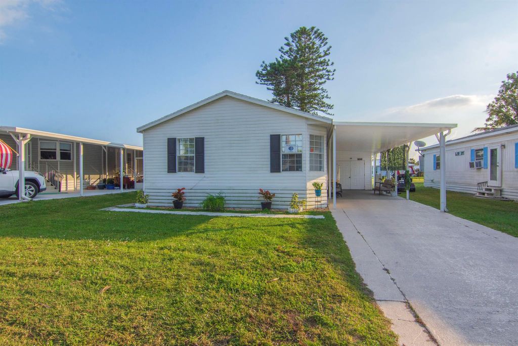 Photo of 71 El Camino Real Real, Port Saint Lucie, FL 34952 (MLS # R11040659)