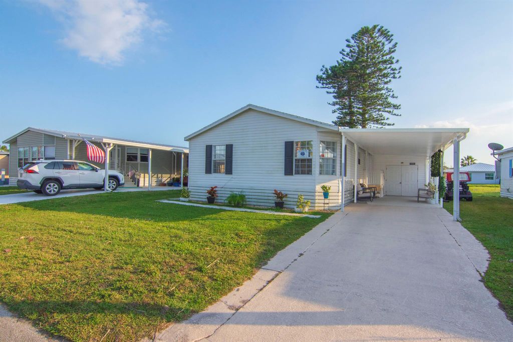 Photo of 71 El Camino Real Real, Port Saint Lucie, FL 34952 (MLS # R11040659)