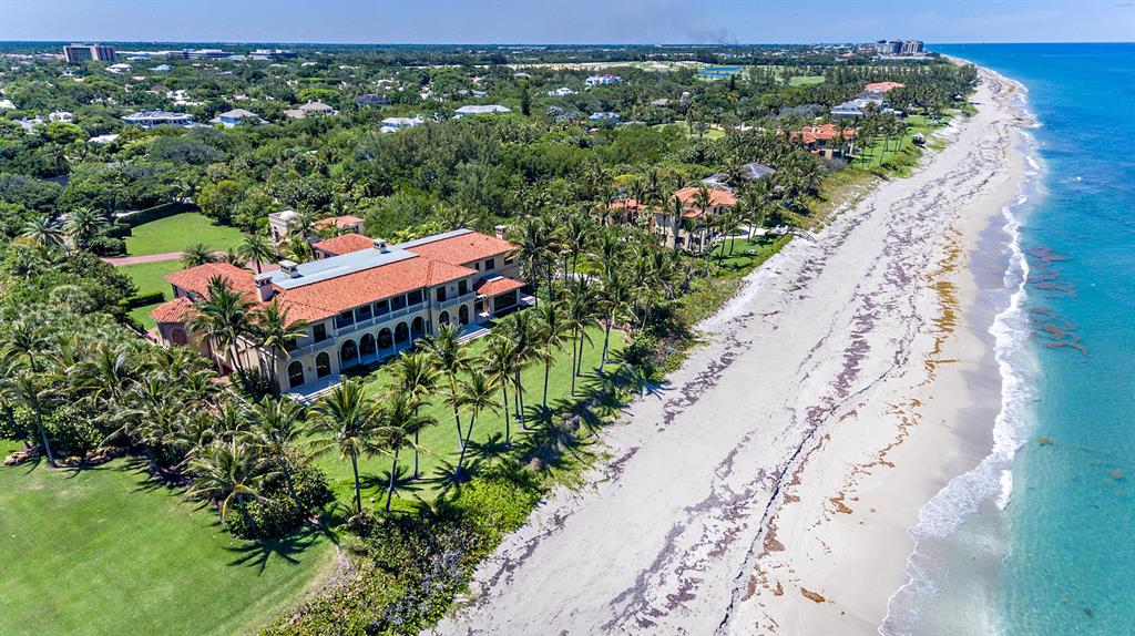 Nestled on a secluded stretch of Seminole beach and lining the azure waters of the Atlantic ocean stands one of South Florida's most prestigious oceanfront estates, Bel Viaggio. Bel Viaggio, translated from Italian to English as 'Beautiful Journey' was built to blend modern living into a historically relevant home reflective of the wealth and opulence of the Fatio era; keeping the collector, world traveler and entertainer in mind. Boasting 190+/- ft. of ocean frontage and situated on approx. 2.9+/- acres of land this custom 9 bedroom 12 full and 4 half bath estate is tucked away in the North Palm Beach neighborhood of Seminole Landing. Just steps from one of the most exclusive clubs in the country, Seminole Golf Club.