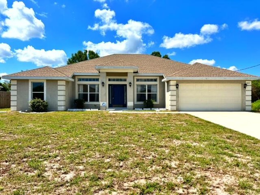 Photo of 582 SW Mccomb Avenue, Port Saint Lucie, FL 34953 (MLS # R10802577)