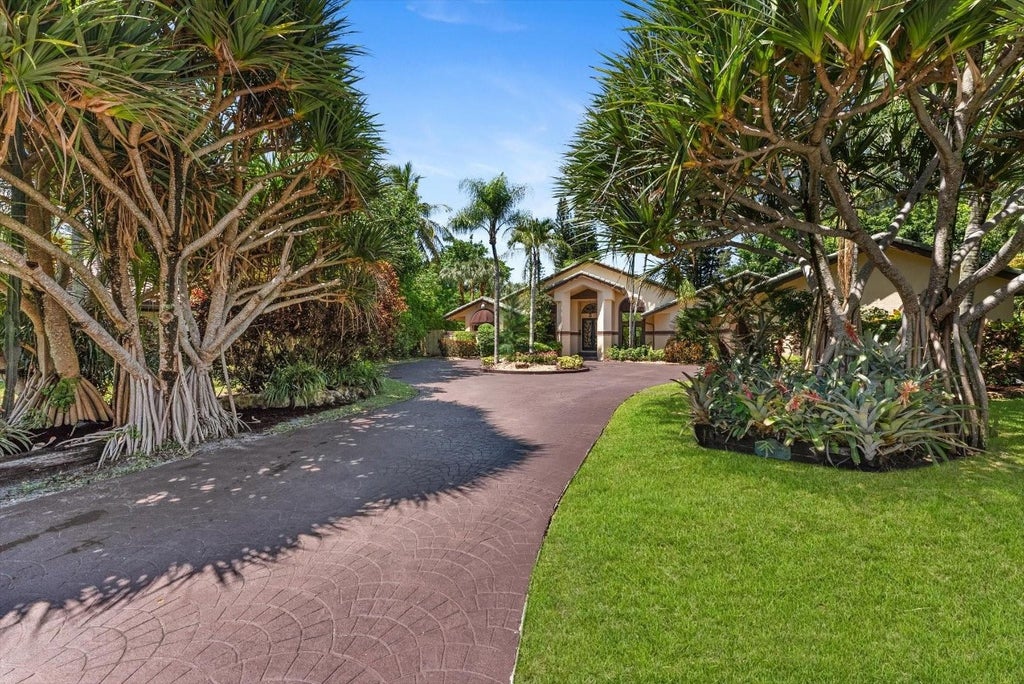 Photo of 6011 NW 69th Manor, Parkland, FL 33067 (MLS # F10511895)