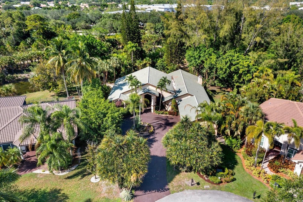 Photo of 6011 NW 69th Manor, Parkland, FL 33067 (MLS # F10511895)