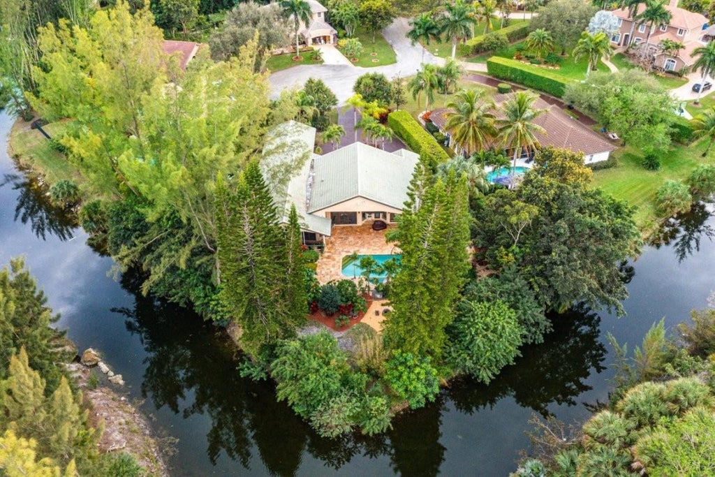 Photo of 6011 NW 69th Manor, Parkland, FL 33067 (MLS # F10511895)