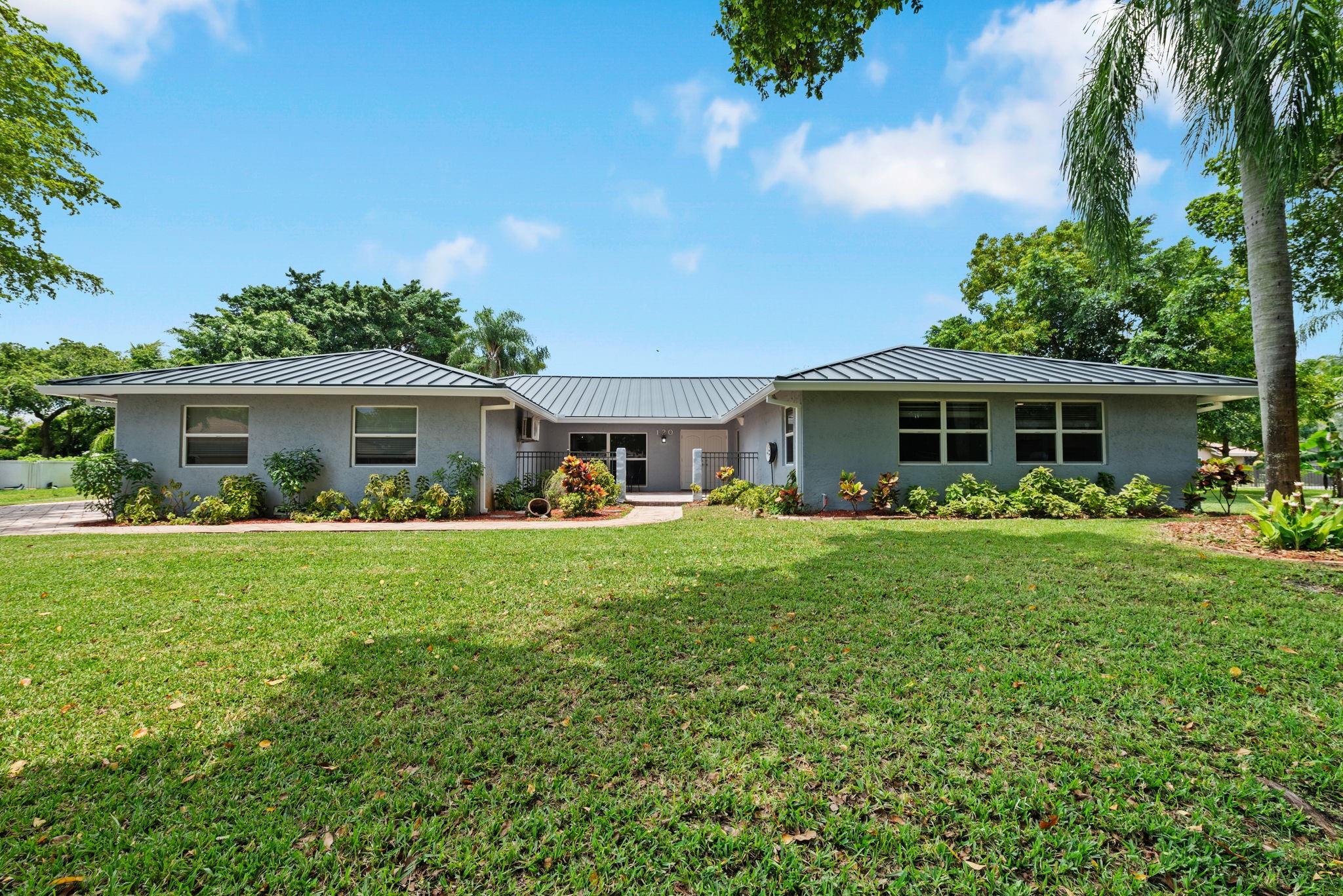 Ready for beautiful sunsets, days in the pool, and walks to the park? This beautiful Shadowwood home in the heart of Springs has it all! The oversized lot (half acre+), driveway and 2000sqft patio on a culdesac make for an entertainer's dream. Inside has 5 full bedrooms PLUS a den space, 2 large living spaces, a gourmet kitchen with island, indoor laundry, vaulted wood ceilings, atrium, updated eletrical, 2-car garage and 4.5 baths (2 cabanas) to give even the biggest families a large, comfortable living space! BRAND NEW METAL roof and gutters, newer ACs, 2 water heaters (1 tankless), impact windows and doors. Close to all highways, several parks, great schools, Amerant arena (go cats!), Coral Square and Sawgrass Mills Mall and the new University strip with shopping and new restaurants!