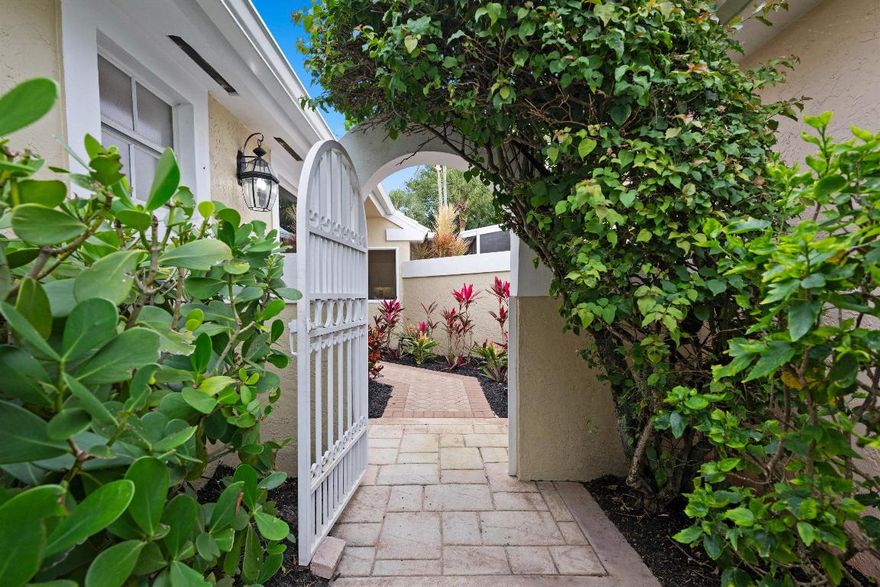 Beautifully renovated Breakers West home with ''Serena & Lily'' Palm Beach decor is nestled along the Mayacoo Lakes Golf Course. This unique oversized lot is larger than most, allowing for open space and lots of natural light. With 2,069 SF Liv Area, this 2 Bedroom+Open Den, 2.5 Bath home is updated and move-in ready! (Open den could be easily enclosed). 3 renovated Baths with new tile, new frameless glass enclosures, new plumbing fixtures, new lighting; New oversized tile floors in Bedrooms & Baths. Kitchen: New Taj Mahal quartzite counters & backsplash, LG & Bosch stainless steel appliances in 2022; New chandeliers & ceiling fans; Removal of popcorn ceilings. Epoxy Garage floor.  HVAC 2022; Custom built-in closets. Beautiful like-new furniture is also negotiable for separate purchase. HOA includes: Lawn care to front/back yard; annual roof, patio, and driveway cleaning; WIFI/Internet & basic cable. Security services include alarm system monitoring, 2 manned Guard Gates, and roving patrol; Common area maintenance.

Breakers West is a unique country club community where club memberships are NOT mandatory. However, residents have the choice of optional/non-mandatory club memberships at either Breakers West (including Breakers Beach Club in the Summer months) or memberships are Mayacoo Lakes Country Club.

Breakers West is conveniently located to downtown West Palm Beach financial center known as "Wall Street South", Kravis Center, Norton Art Museum, Worth Ave shopping, Dixie Highway's eclectic shops, PBI airport as well as Wellington equestrian amenities. Don't miss this great opportunity to enjoy the Palm Beach County lifestyle this season!