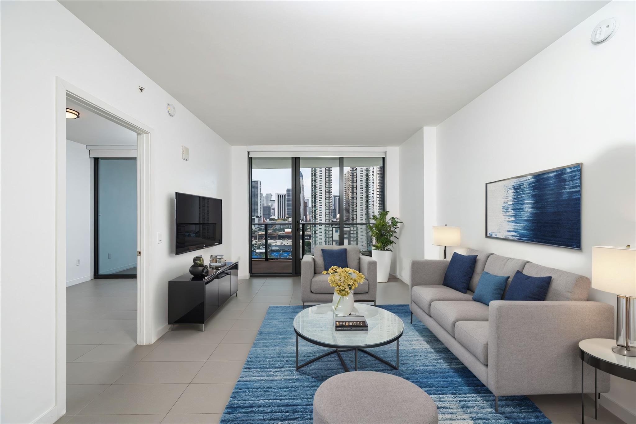 Spectacular 2 bed / 2 bath residence at CANVAS with stunning bay and city views. Features include an open kitchen, split floor plan, modern tile throughout, impact windows and doors, and a spacious balcony perfect for enjoying skyline sunsets and city lights. CANVAS offers 30,000+ sq. ft. of resort-style amenities including sunrise and sunset pools, spa, sauna, 3,000 sq. ft. state-of-the-art gym, yoga garden, racquetball court, theater, social and game rooms, children’s playroom, eco-friendly gardens, indoor/outdoor café and bar, plus 24/7 security, concierge, on-site management, and self-parking.