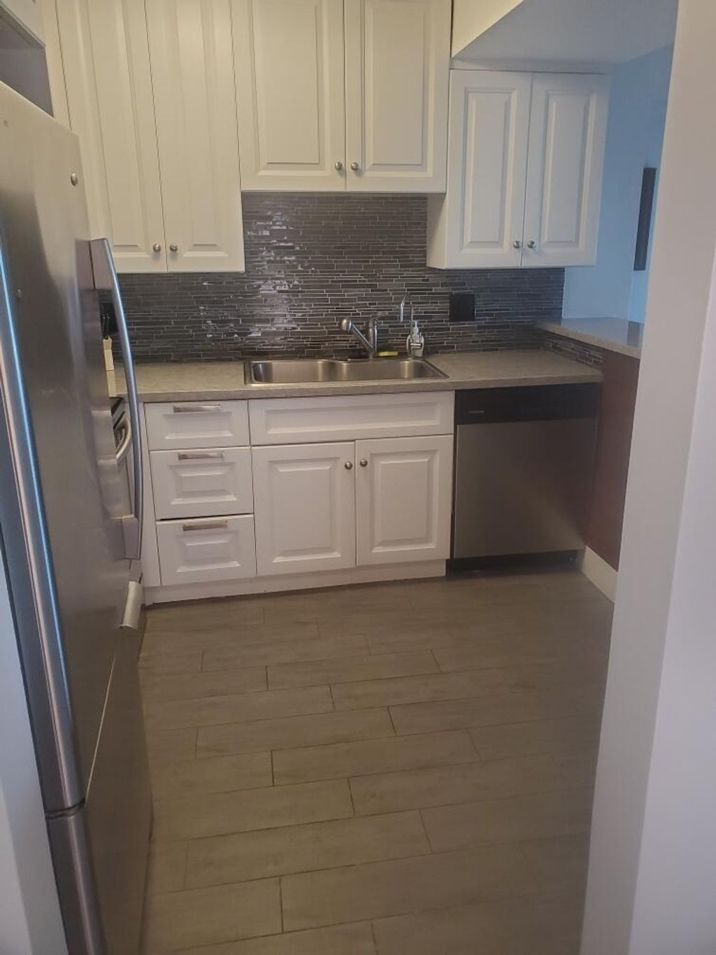 Photo of 610 Tennis Club Drive #403, Fort Lauderdale, FL 33311 (MLS # B26003929)