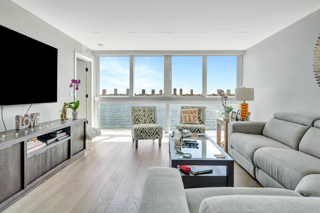 Photo of 301 LAKE SHORE Drive #302, Lake Park, FL 33403 (MLS # B26068285)