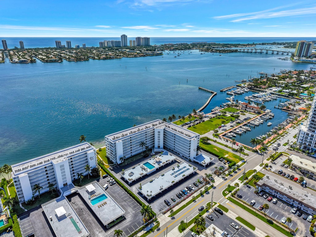 Photo of 301 LAKE SHORE Drive #302, Lake Park, FL 33403 (MLS # B26068285)