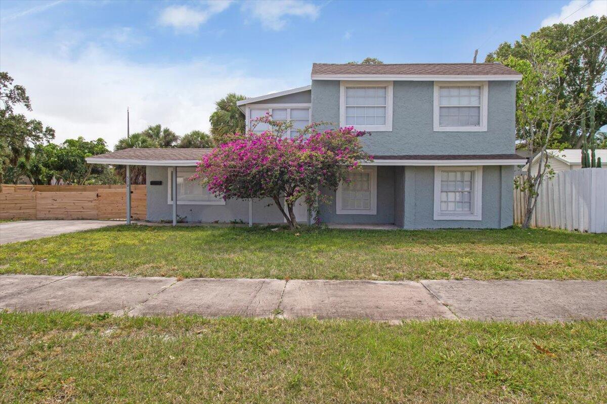 Short term OK! All utilities included! Remodeled, bright 2nd floor unit with in-unit laundry in Lake Park historic home just off of Park Avenue!Discover the perfect blend of historic charm and modern living in this beautifully remodeled one-bedroom unit in the heart of Lake Park. Outdoor comfort: enjoy the ambiance of a large, fully fenced yard - perfect for relaxation, gardening, or entertaining with improved patio area, sun sail with string lights and new landscaping being installed early January. Prime Location walkable to Park Ave restaurants, bars and entertainment, Kelsey Park waterfront, short drive to North Palm, Jupiter, West Palm Beach, Turnpike and 95. Furnishings negotiable, boat or RV parking can be arranged.