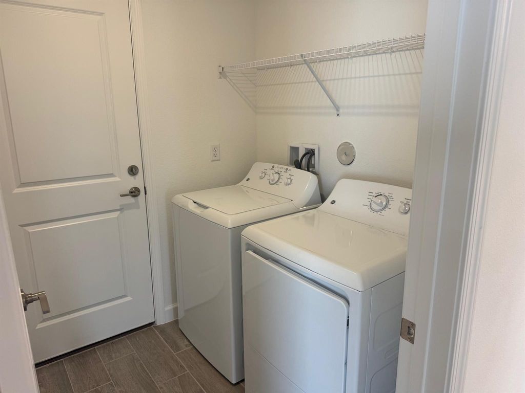 Photo of 6002 NW Pickering Drive, Port Saint Lucie, FL 34987 (MLS # R11059881)