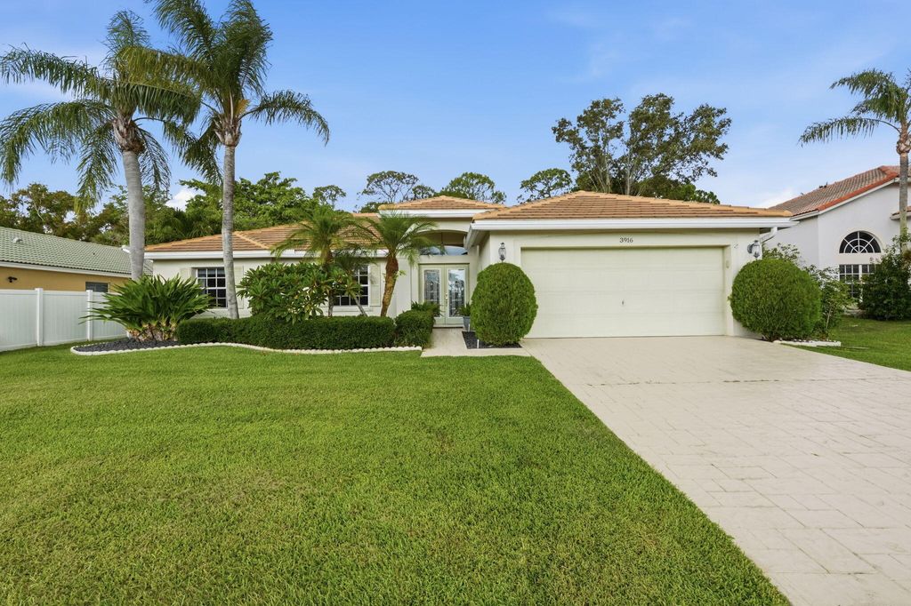 Photo of 3916 Cypress Lake Drive, Lake Worth, FL 33467 (MLS # B26034602)