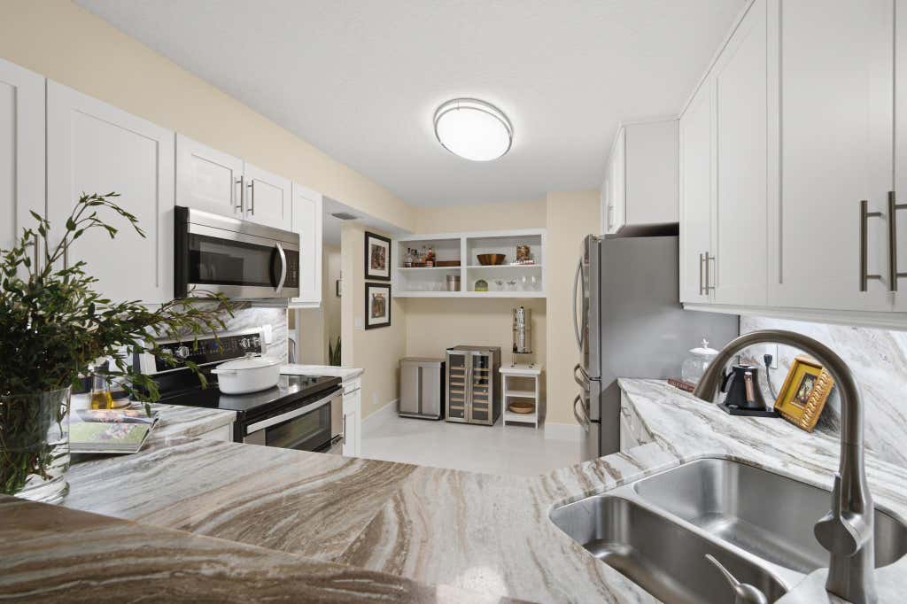 Photo of 7232 FAIRFAX Drive #205, Tamarac, FL 33321 (MLS # B26053760)