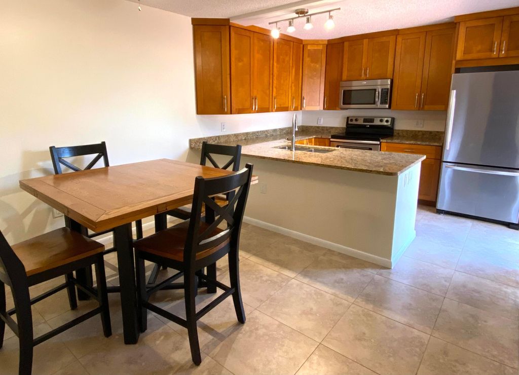 Photo of 2904 SW Sunset Trace Circle, Palm City, FL 34990 (MLS # B26029420)