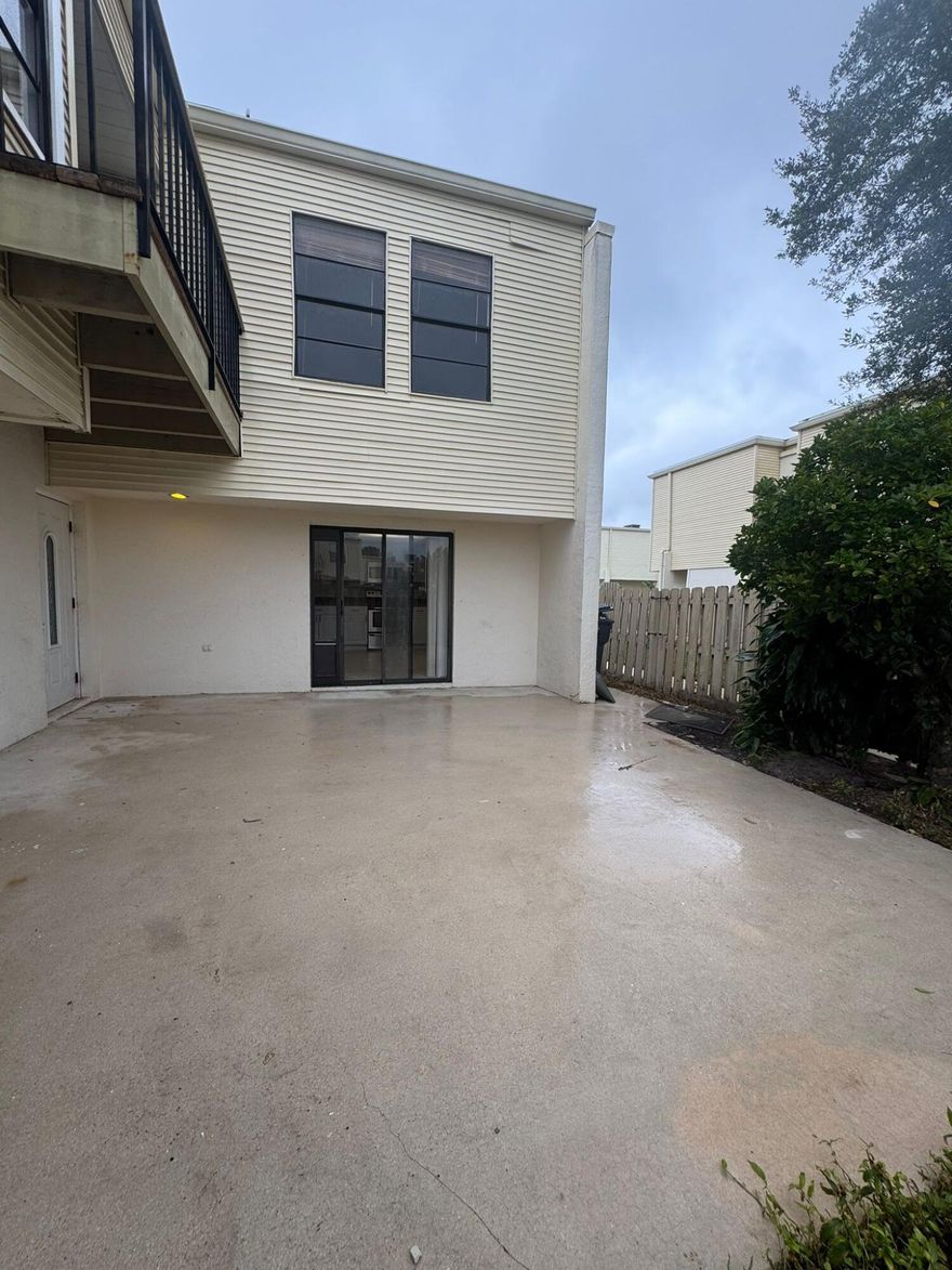 Beautiful 2-bedroom, 2.5-bath home ideally located directly across from the Recreation Center & Aquatic Complex, and just minutes from The Mall at Wellington Green, shopping, dining, and top-rated A schools. Features a modern kitchen with granite countertops and stainless steel appliances, tile flooring throughout the living areas, and new carpet in both bedrooms. Enjoy abundant storage with spacious walk-in closets, plus a private fenced courtyard perfect for relaxing or entertaining. A wonderful opportunity to enjoy comfort, convenience, and community living!