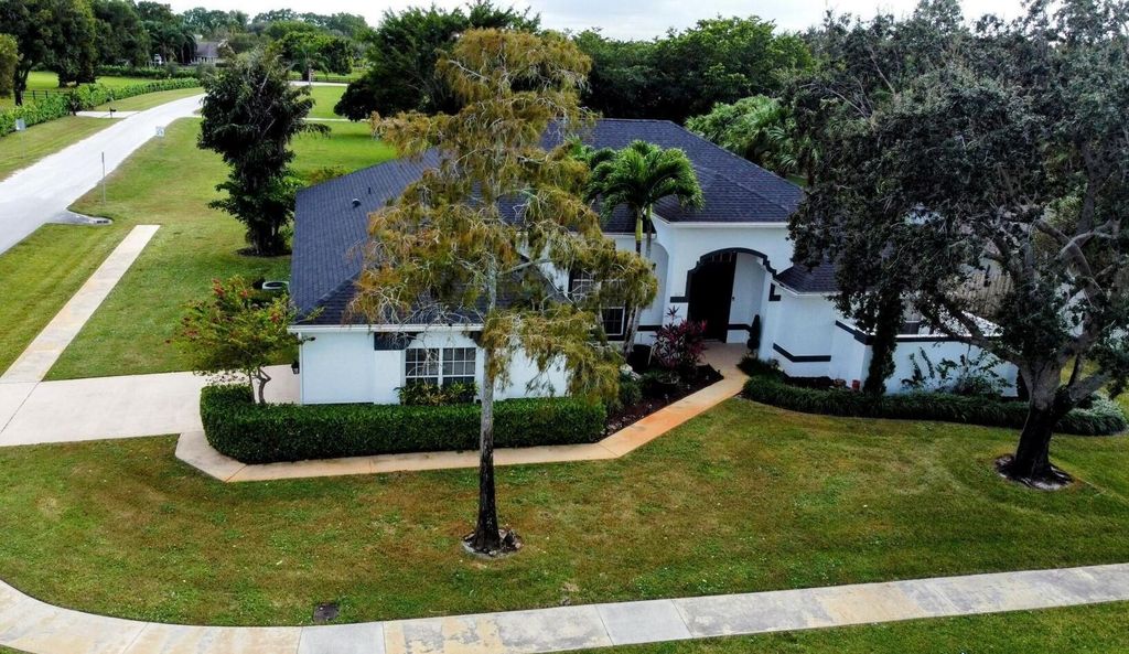 Photo of 1847 Primrose Lane, Wellington, FL 33414 (MLS # R10931916)