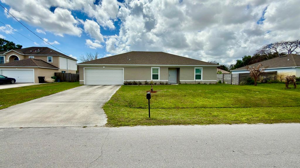 Photo of 6446 NW Polly Court, Port Saint Lucie, FL 34983 (MLS # B26013295)