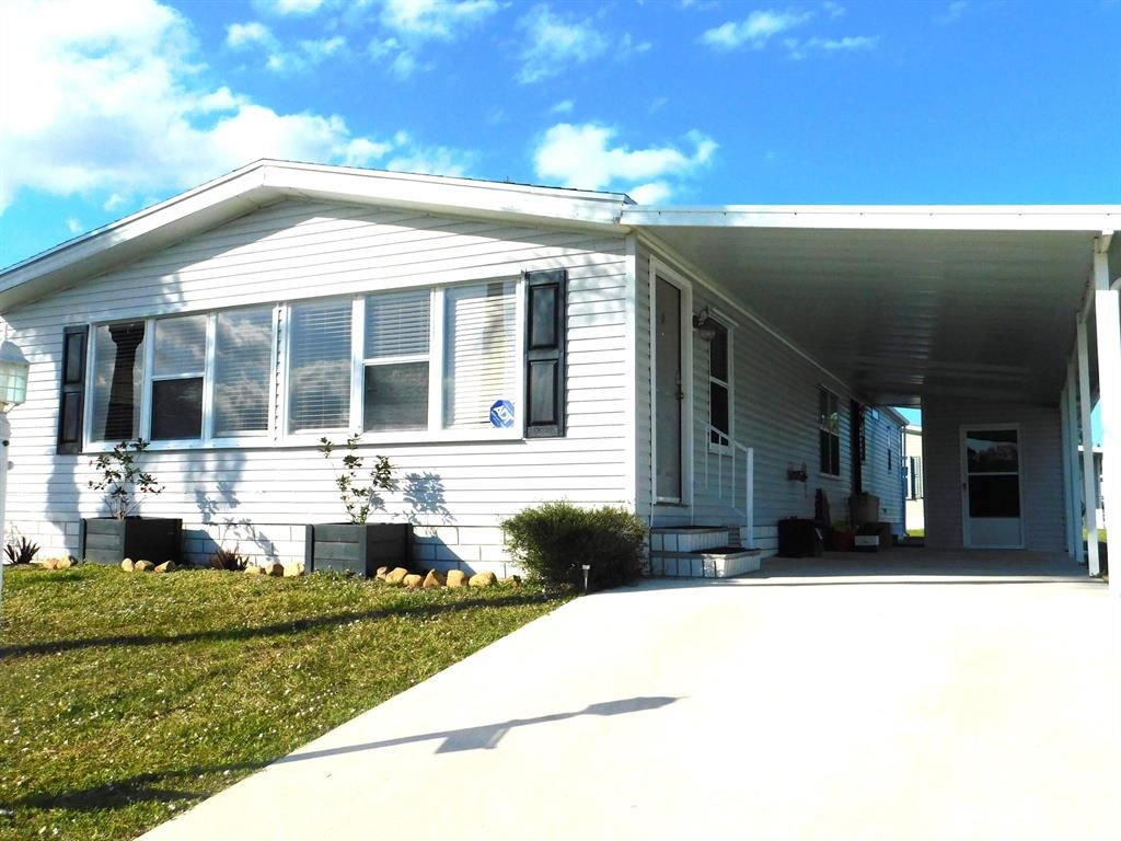 Photo of 487 Tropical Isles Circle, Fort Pierce, FL 34982 (MLS # R10877169)