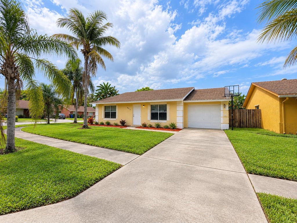 Photo of 6117 Blue Grass Circle, Lake Worth, FL 33463 (MLS # B26080417)
