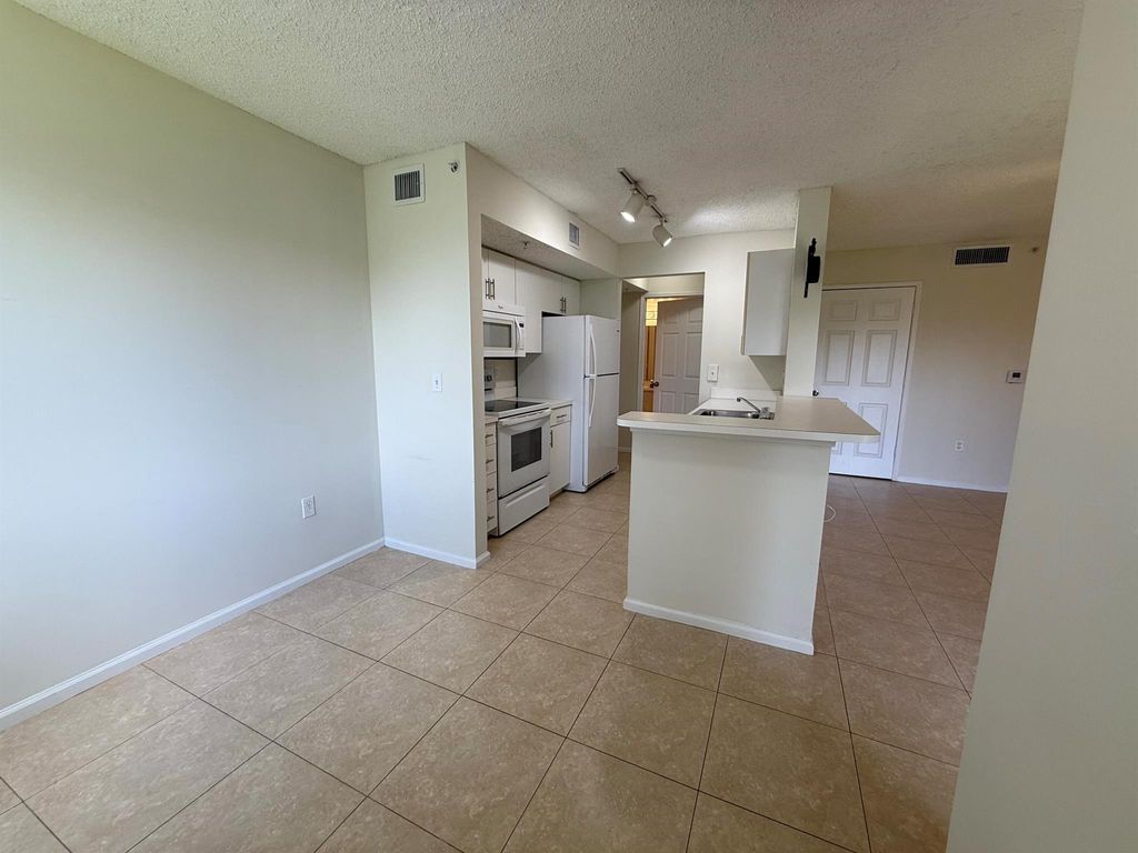 Photo of 266 Village Boulevard #6210, Tequesta, FL 33469 (MLS # R11101997)