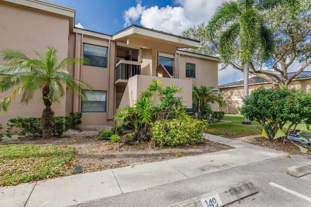 Photo of 12829 Briarlake Drive #204, West Palm Beach, FL 33418 (MLS # R10936667)