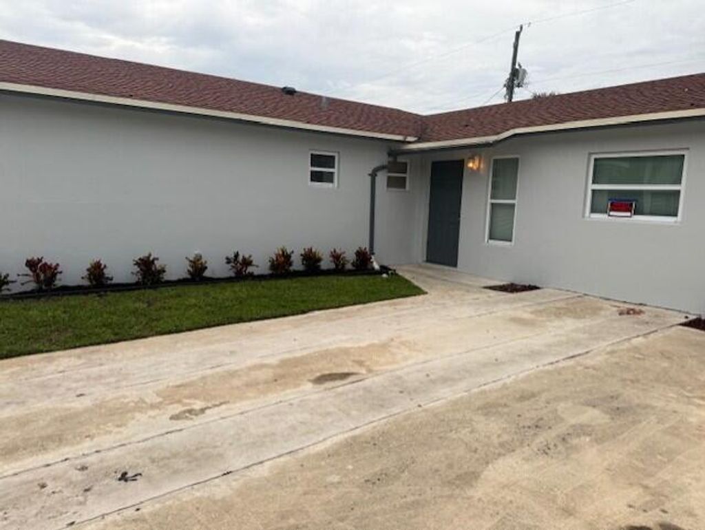 Photo of 1240 W 26th Street, Riviera Beach, FL 33404 (MLS # R11123771)