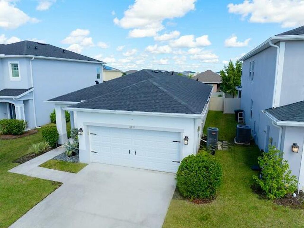 Photo of 10885 SW Robbia Way, Port Saint Lucie, FL 34987 (MLS # R11133101)