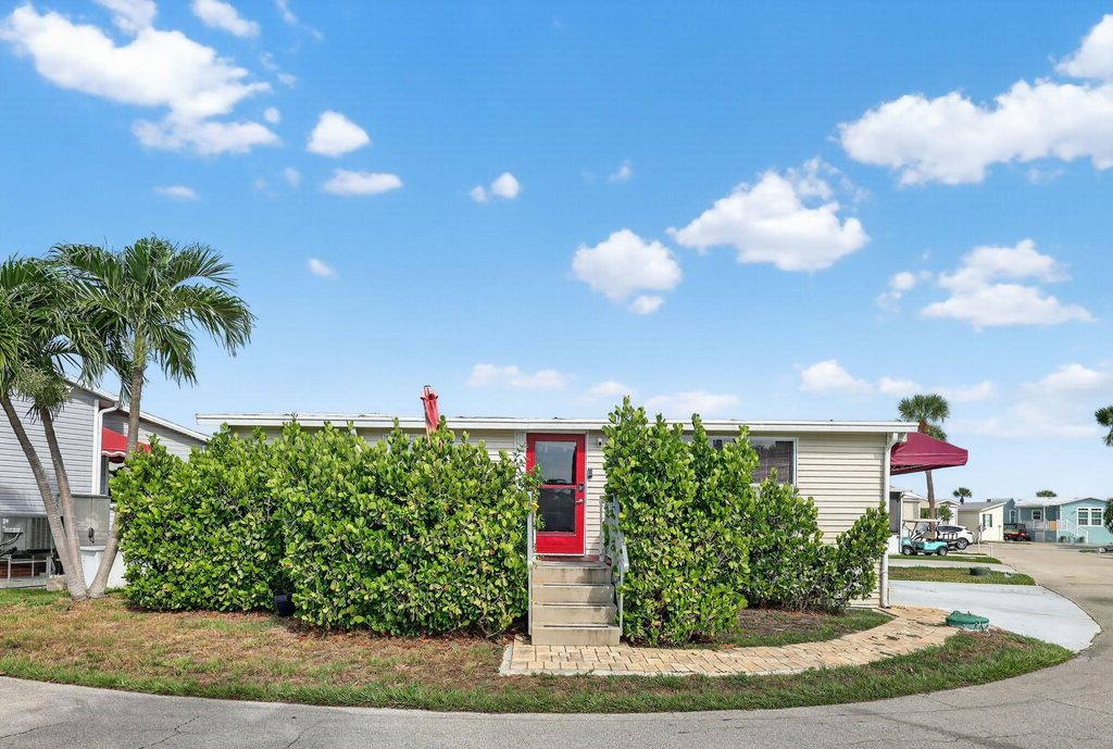 Photo of 91 Nettles Boulevard, Jensen Beach, FL 34957 (MLS # R11119061)