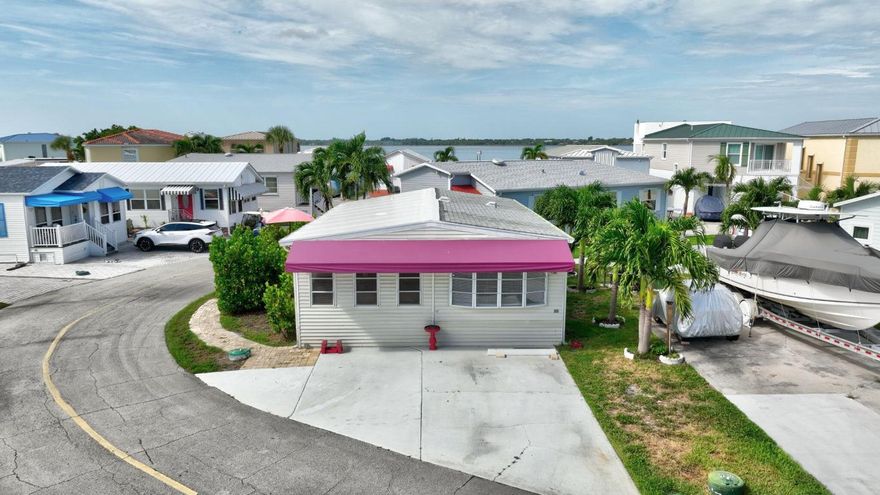 BEACH COTTAGE GEM! This beautifully updated 2-bedroom, 1.5-bath home is perfectly situated on the highly sought-after Celebrity Island, on Nettles Island. TURNKEY with both style and comfort, this property features spacious living areas, upgraded flooring throughout, and a modern kitchen with sleek stainless appliances. Both bathrooms have been tastefully updated, creating a fresh, move-in-ready space. With ample square footage, this home provides room to relax, entertain, and enjoy the vibrant community lifestyle Nettles Island is known for. Step outside and embrace the charm of this waterfront golf cart community, where you can enjoy two pools (one on the ocean, one on the river), tennis, pickleball, a clubhouse, café, marina, private beach access & more.  Motivated Seller!