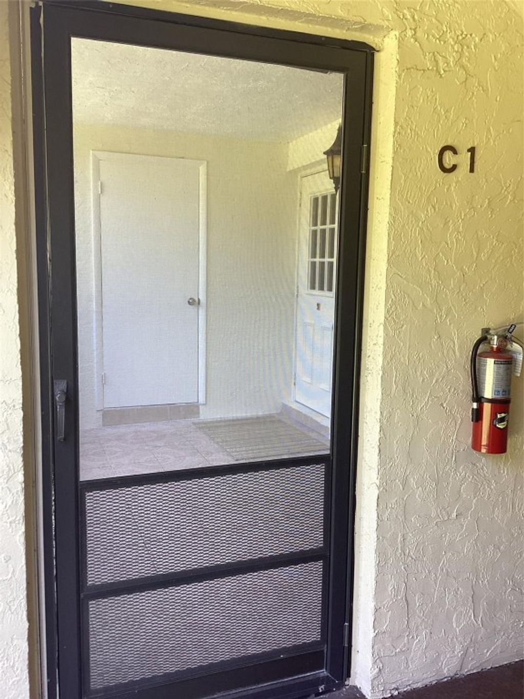 Photo of 5927 La Pinata Boulevard #C-1, Greenacres, FL 33463 (MLS # F10539817)