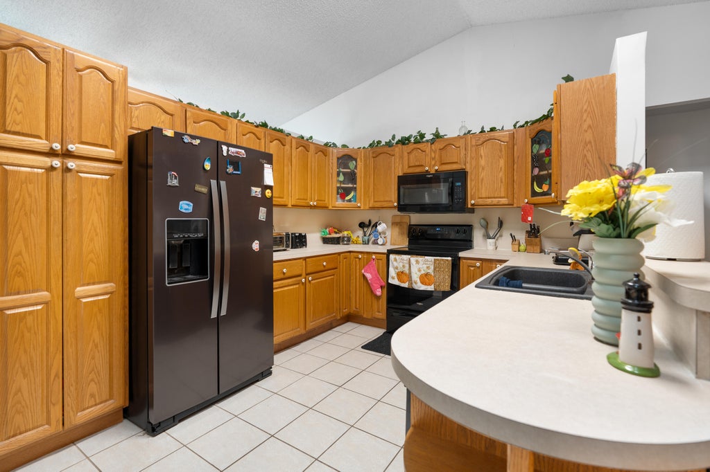 Photo of 565 SW CHERRYHILL Road, Port Saint Lucie, FL 34953 (MLS # B26073215)