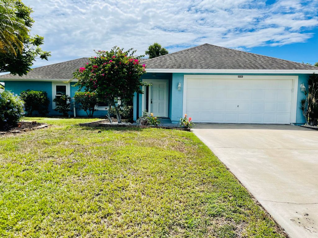 Photo of 2661 SW Feather Terrace Ter, Port Saint Lucie, FL 34953 (MLS # R10817120)