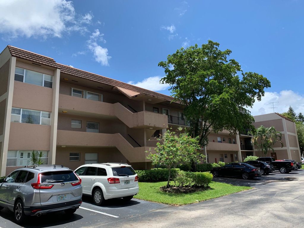 Photo of 8350 Sands Point Boulevard #E202, Tamarac, FL 33321 (MLS # B26004660)