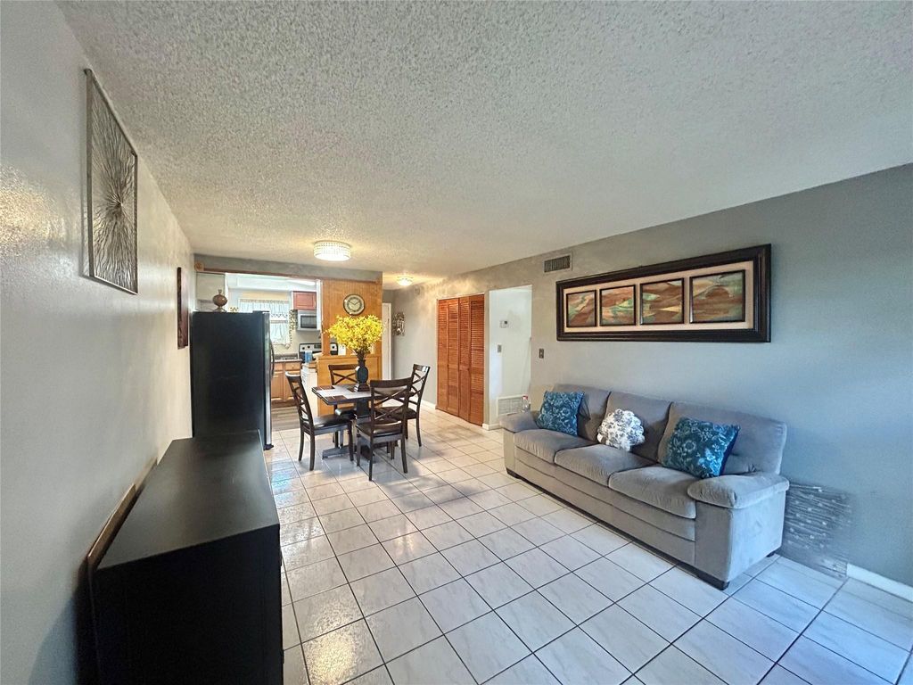 Photo of 6100 Forest Hill Boulevard #101, West Palm Beach, FL 33415 (MLS # F10530470)