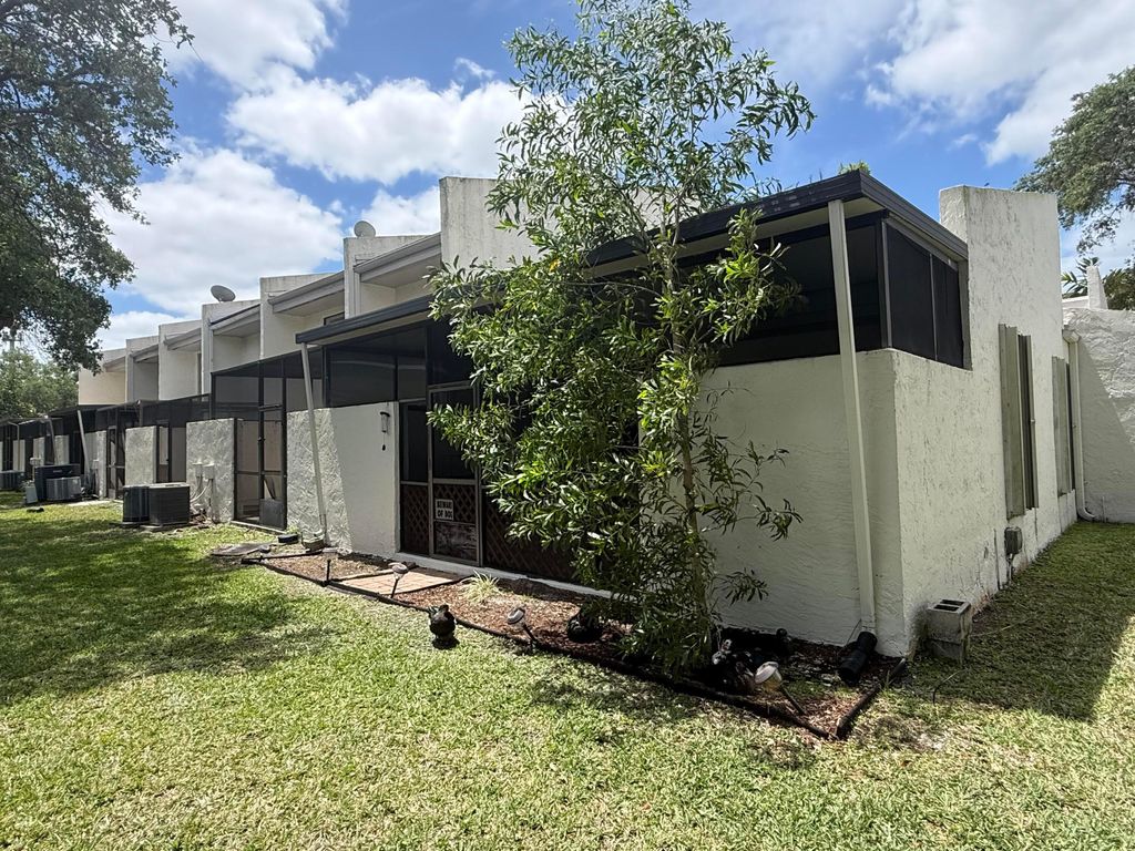 Photo of 1097 NW 98th Terrace #110, Pembroke Pines, FL 33024 (MLS # B26008170)