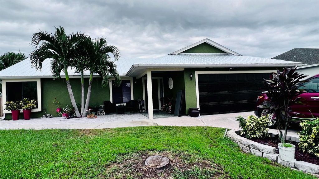 Photo of 1355 SW Granville Avenue, Port St Lucie, FL 34953 (MLS # R10921960)