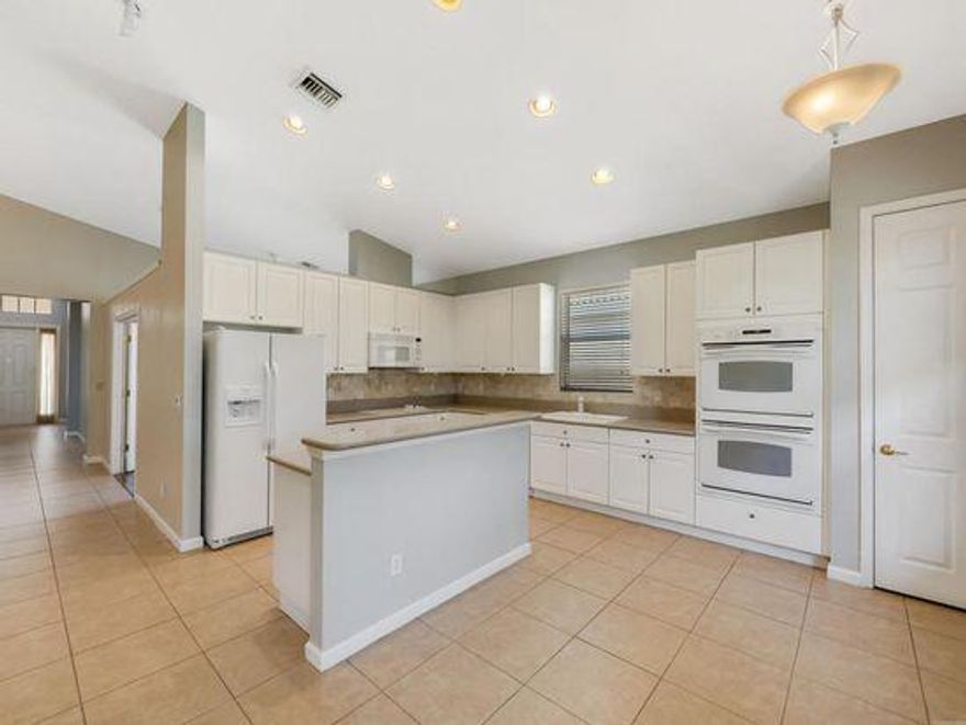 Spacious 3/2/2 with a DEN and Large Master bedroom and bath available for immediate occupancy.This is a well maintained gated community with many amenities (swimming pool, free internet, volleyball, basketball,mini excercise gym) and beautiful clubhouse.