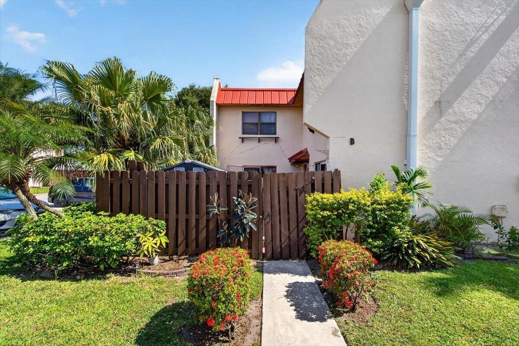 Photo of 6351 Seven Springs Boulevard #B, Greenacres, FL 33463 (MLS # B26038806)