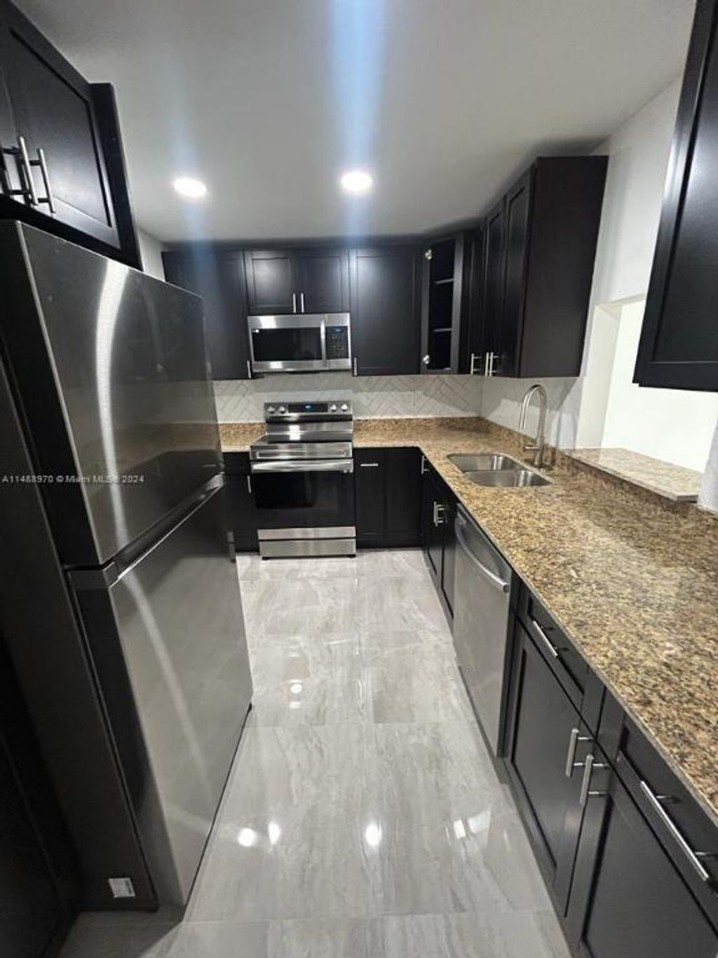 Photo of 4314 NW 9th Avenue #4-3a, Deerfield Beach, FL 33064 (MLS # R11129969)