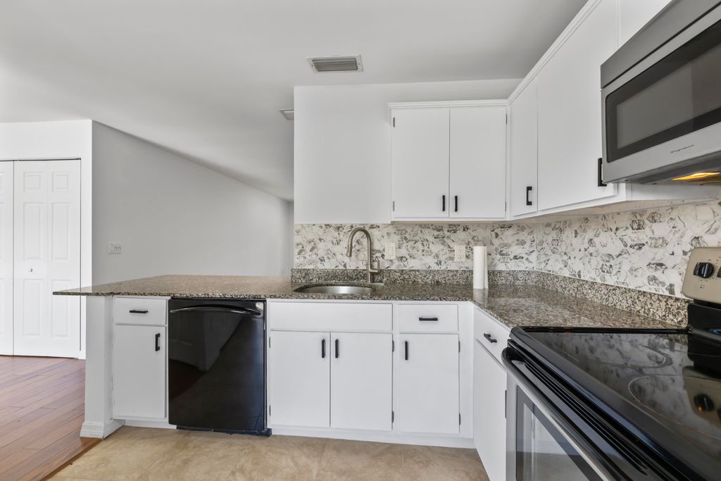 Photo of 364 Quebec Court, Royal Palm Beach, FL 33411 (MLS # B26016054)