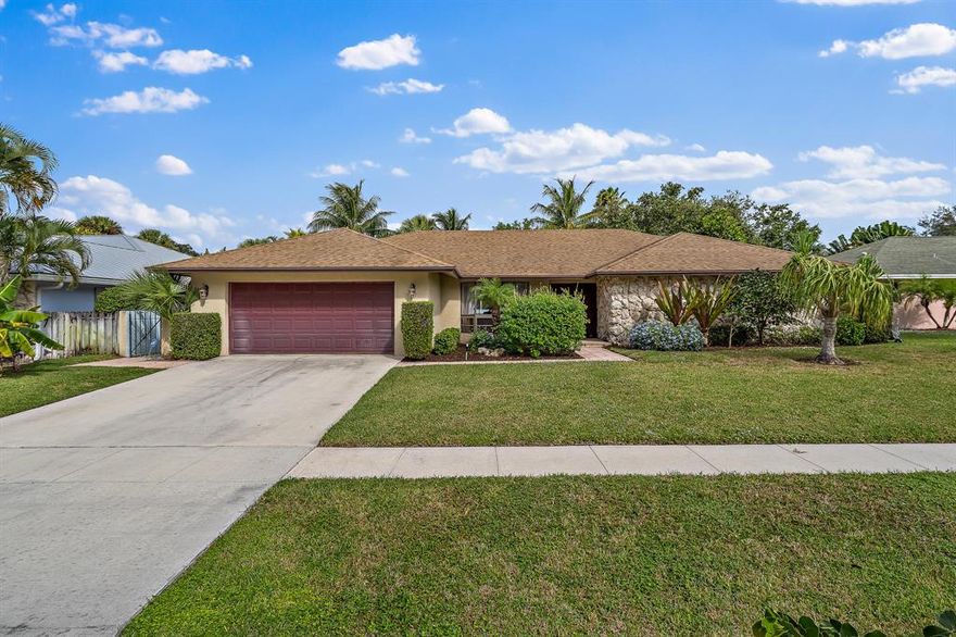 This single story CBS 3 bedroom, 3 bath, pool home is located off of Prosperity Farms in Palm Beach Gardens. No HOA!  The interior offers a spacious design with vaulted ceilings and an open split floor plan. The main living area is perfect for entertaining and has beautiful wood flooring and neutral paint. The kitchen has granite countertops, wood cabinetry and a great view overlooking the pool. The master is extremely large with an oversized walk in closet with custom cabinetry. The master bathroom offers newer cabinetry, granite counters, and frameless shower door. With 600 SQ Ft of screened in porch that leads to the extra large pool, refinished in 2014, the backyard is perfect for grilling and entertaining. Take a look today and don't miss out!!!!