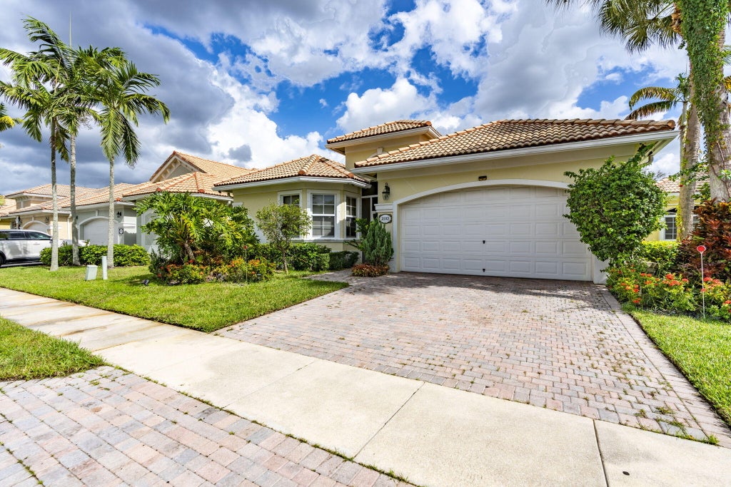 Photo of 2312 Curley Cut, West Palm Beach, FL 33411 (MLS # B26090809)