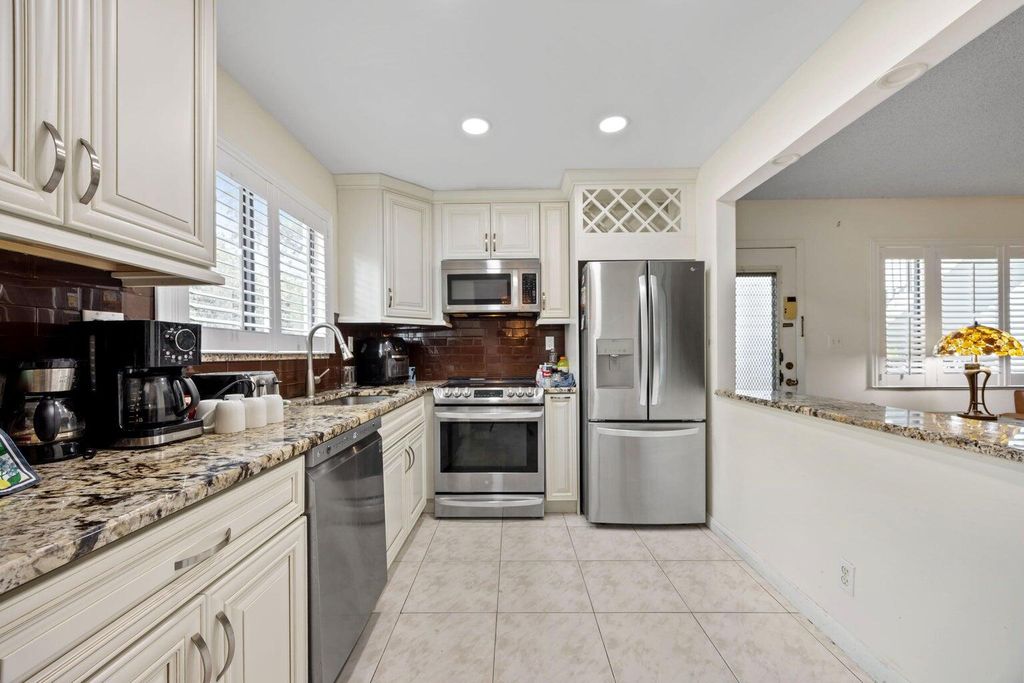 Photo of 15072 Ashland Place #124, Delray Beach, FL 33484 (MLS # R11166431)